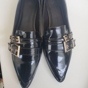 Black pointed toe loafers